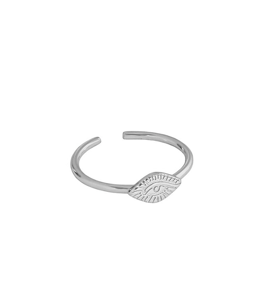 A sterling silver ring with an open band design and the eye of providence featuring at the front of the ring.