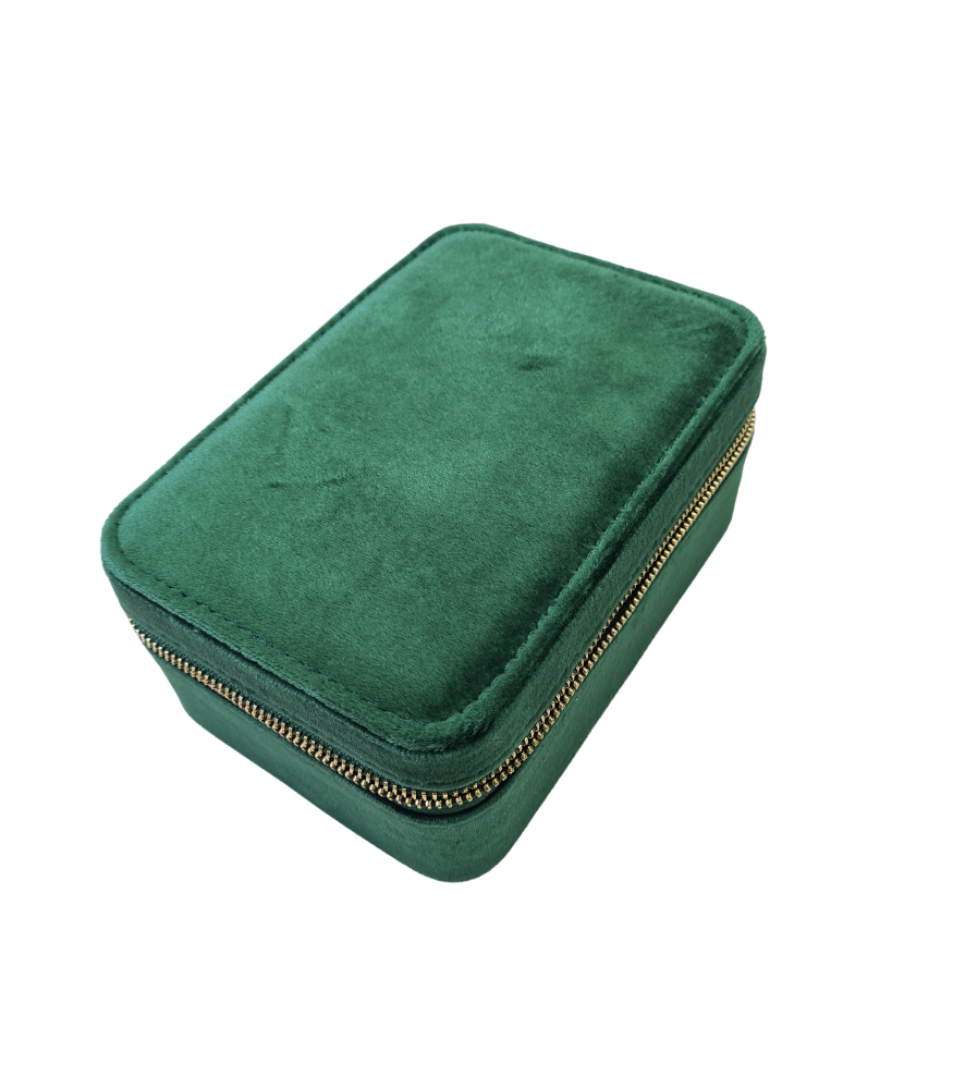 A jewellery storage box in a dark green colour with a velvet fabric and zip fastening.
