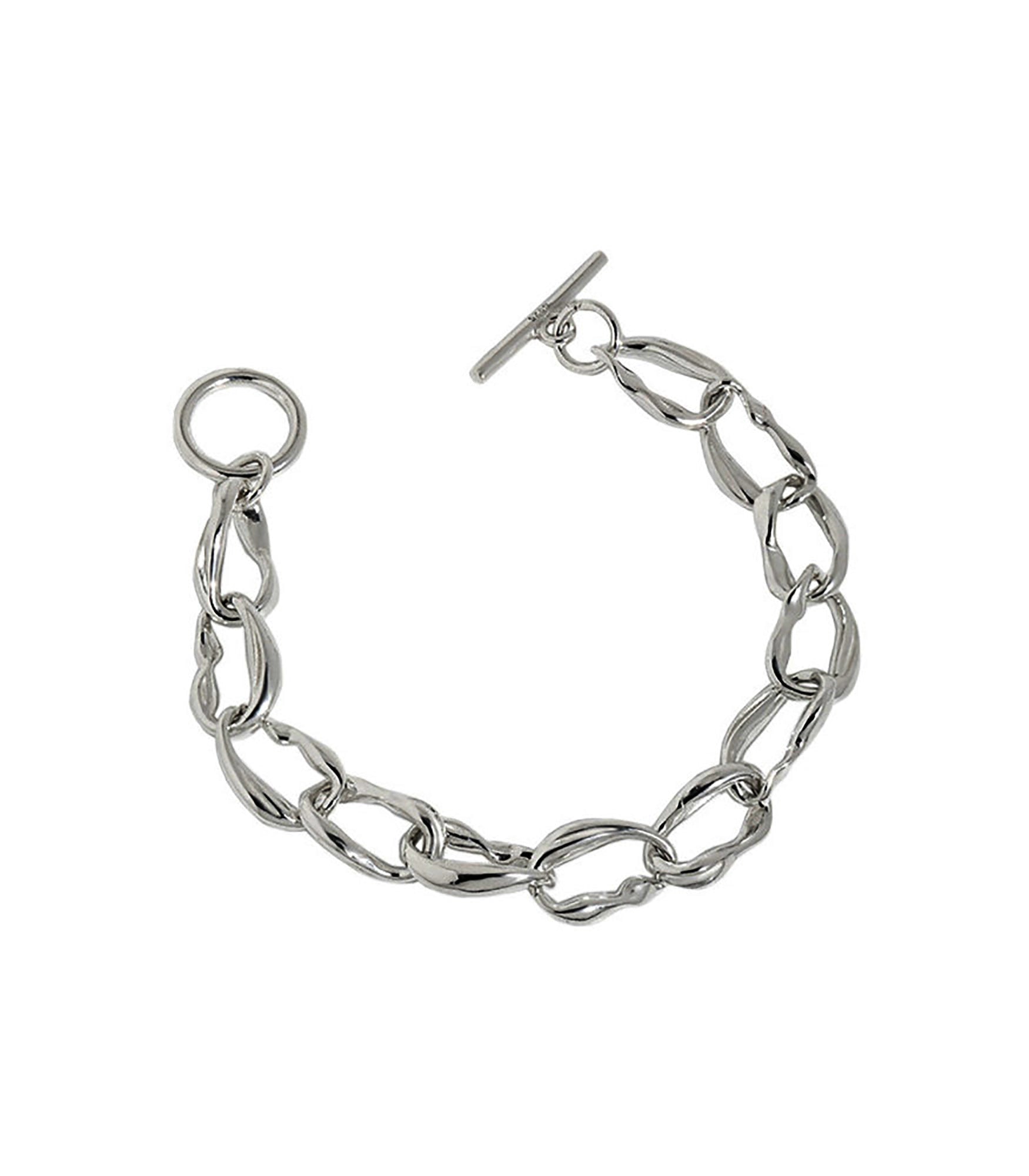 A sterling silver bracelet with a toggle clasp fastening. The bracelet is made up of irregular shaped rings linking together