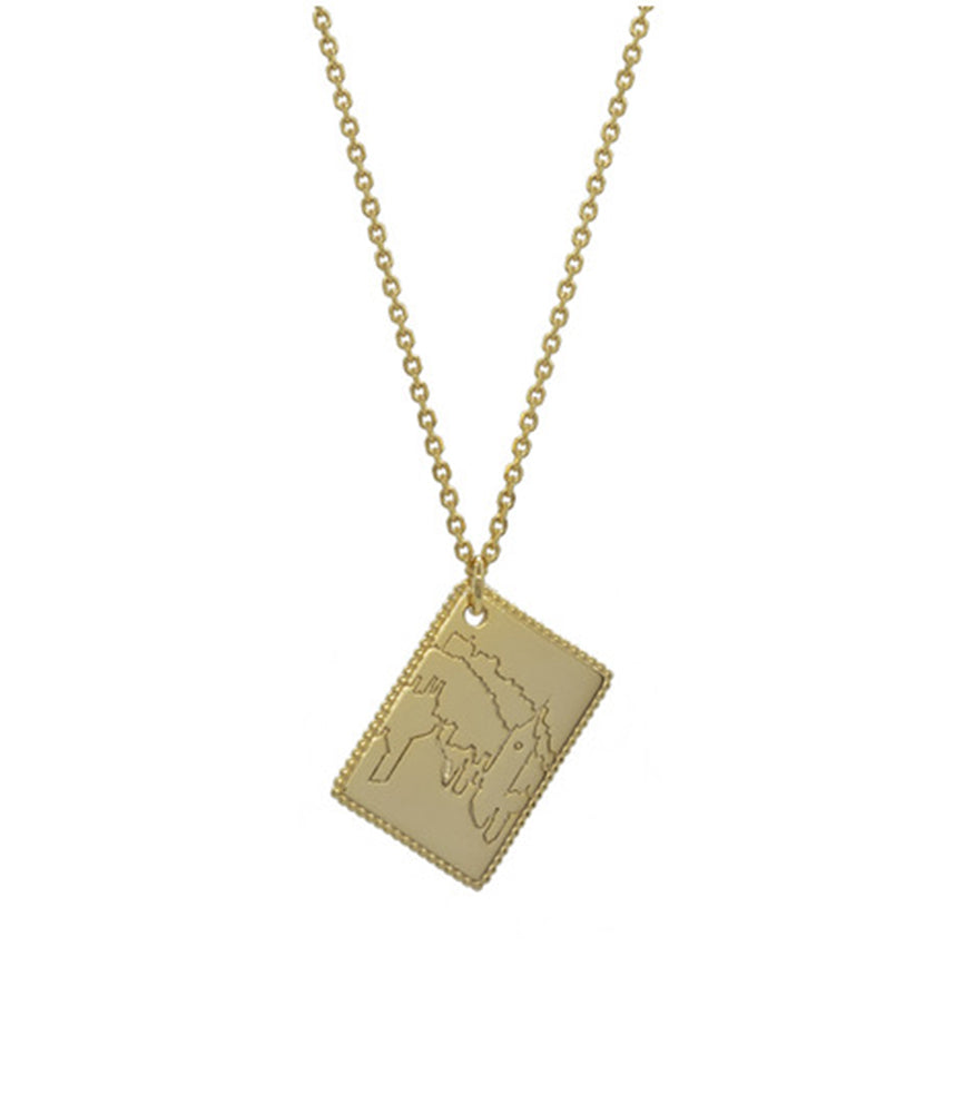 A gold plated necklace with a postcard pendant. The pendant is engraved with views from Edinburgh City.