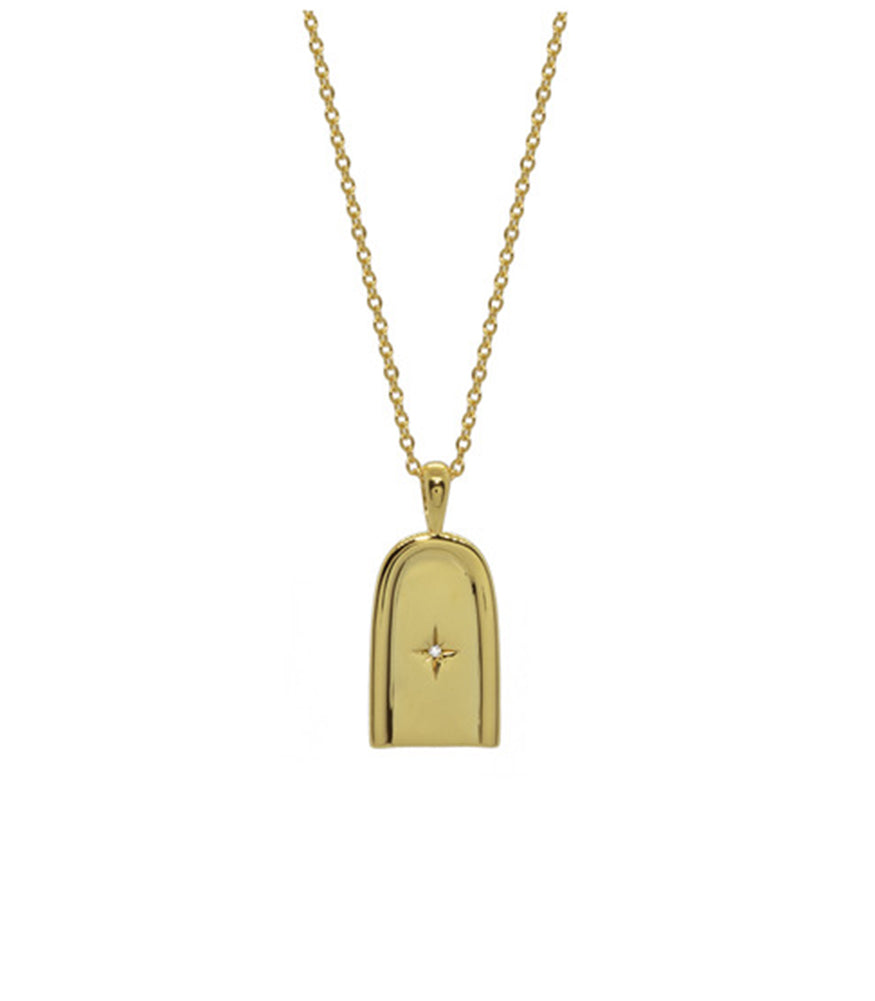 A gold plated necklace. The necklace has a dainty chain with a curved arch shaped pendant.