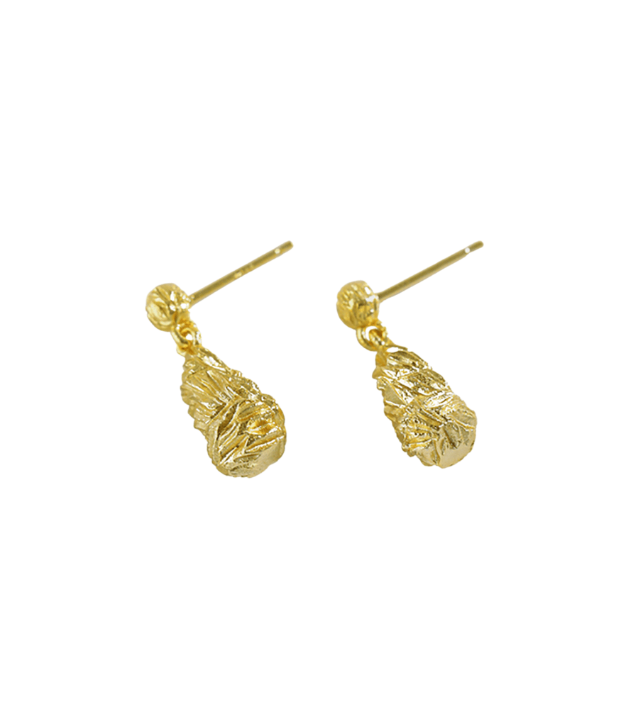 A pair of gold plated drop earrings. The earrings are textured, resembling stalactites found in a cave.