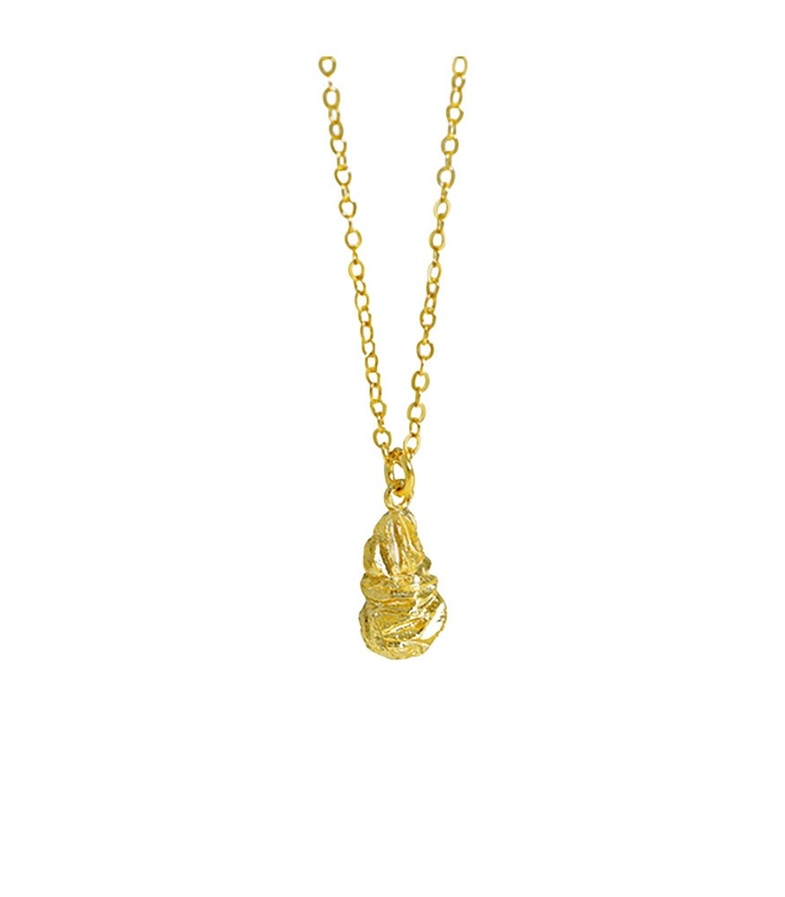 A gold plated necklace with a dainty chain and hanging teardrop nugget pendant which has a rocky texture.