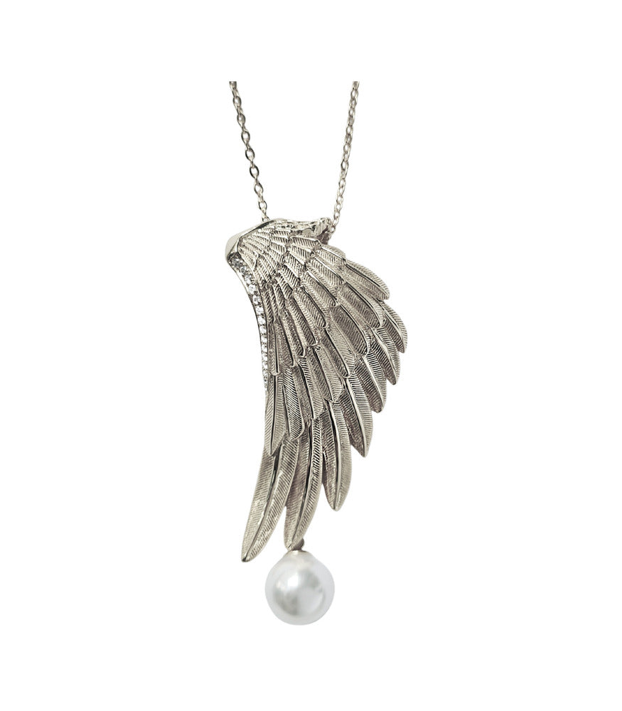 A sterling silver wing pendant with a white pearl hanging from a chain.
