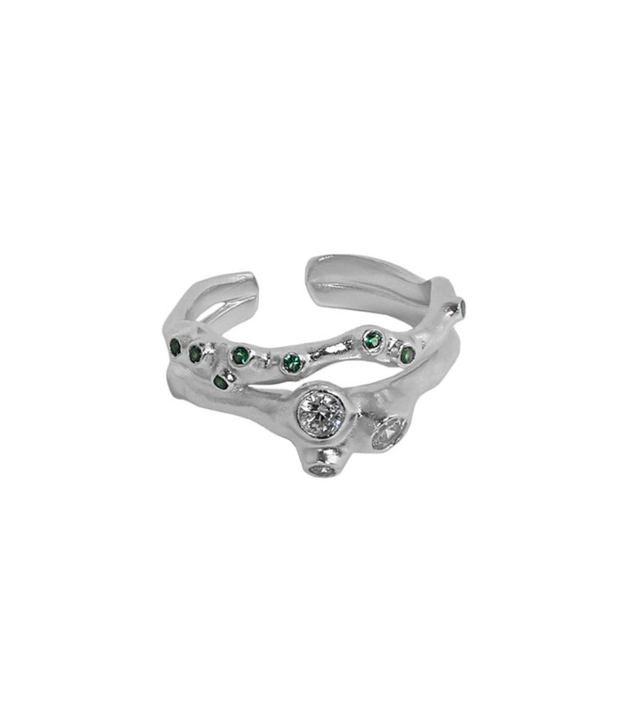 A sterling silver ring with an open band. The ring has an irregularly shaped band, reflecting the organic movement of flowing water.