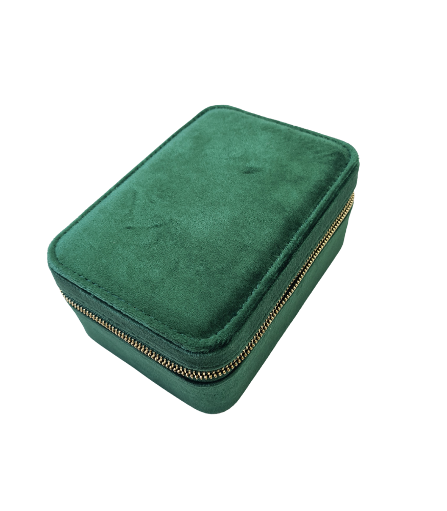 A jewellery storage box in a dark green colour with a velvet fabric and zip fastening. 