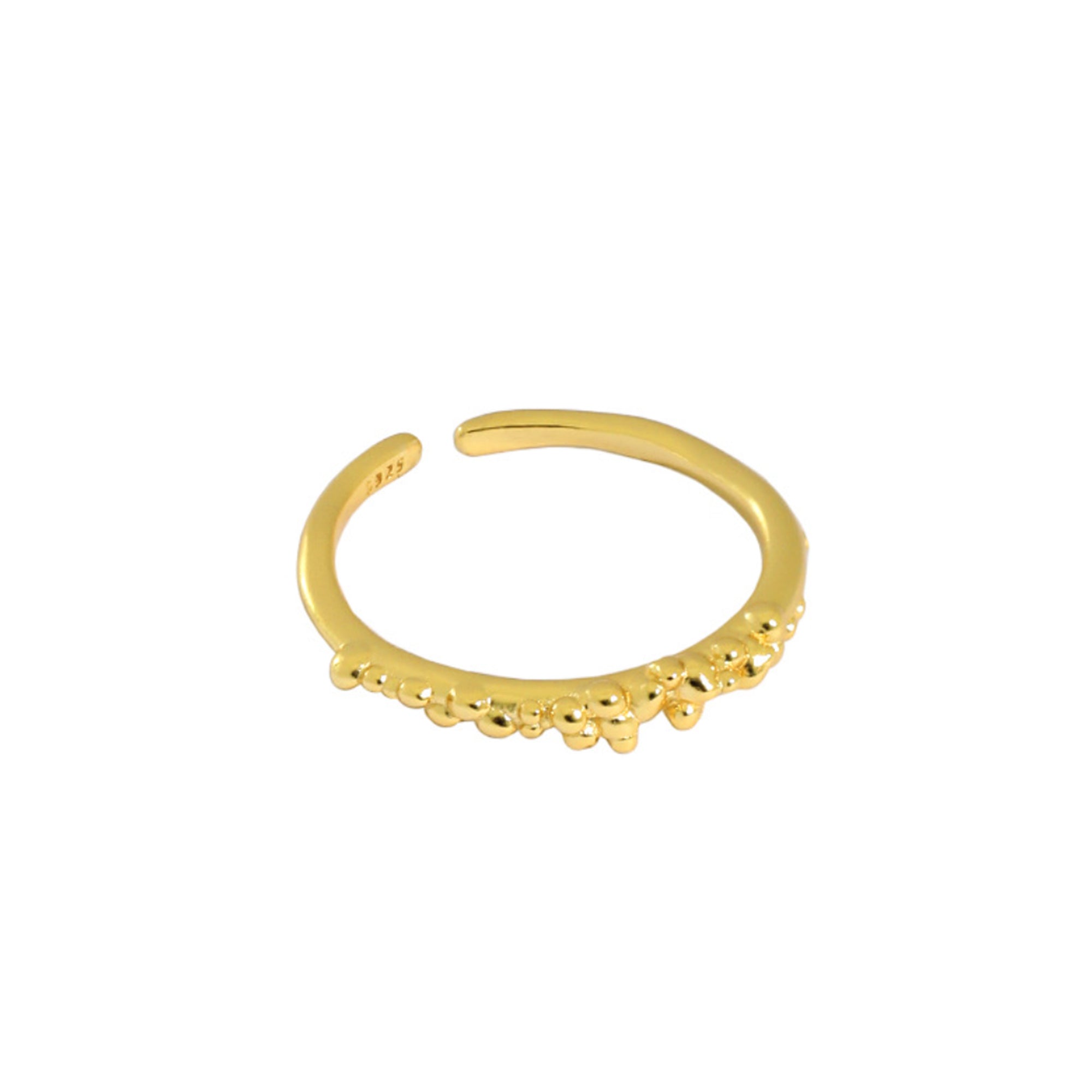 A gold vermeil ring. The ring has a dainty band with a bubbled texture at the front.