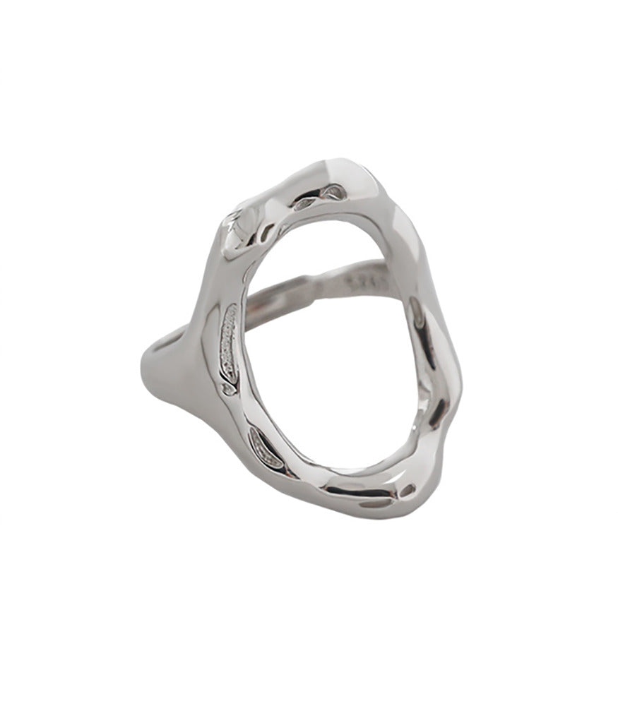 A polished, sterling silver ring with an oval shape at the front of the ring.