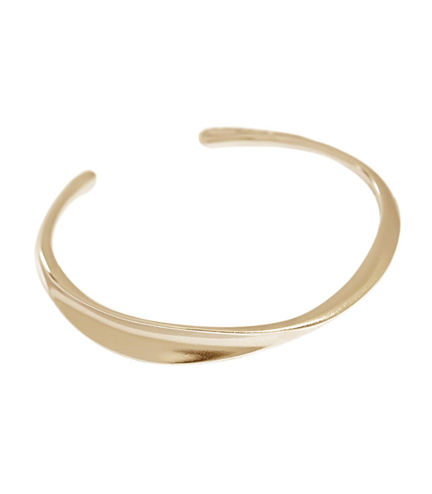 A smoth gold vermeil bangle with a polished finish.
